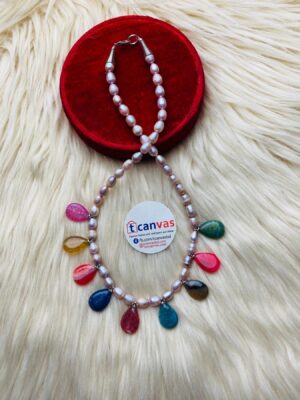 Pearl and stone made necklace