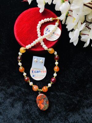 Pearl and stone made necklace