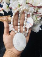 Pearl necklace with shell pendant